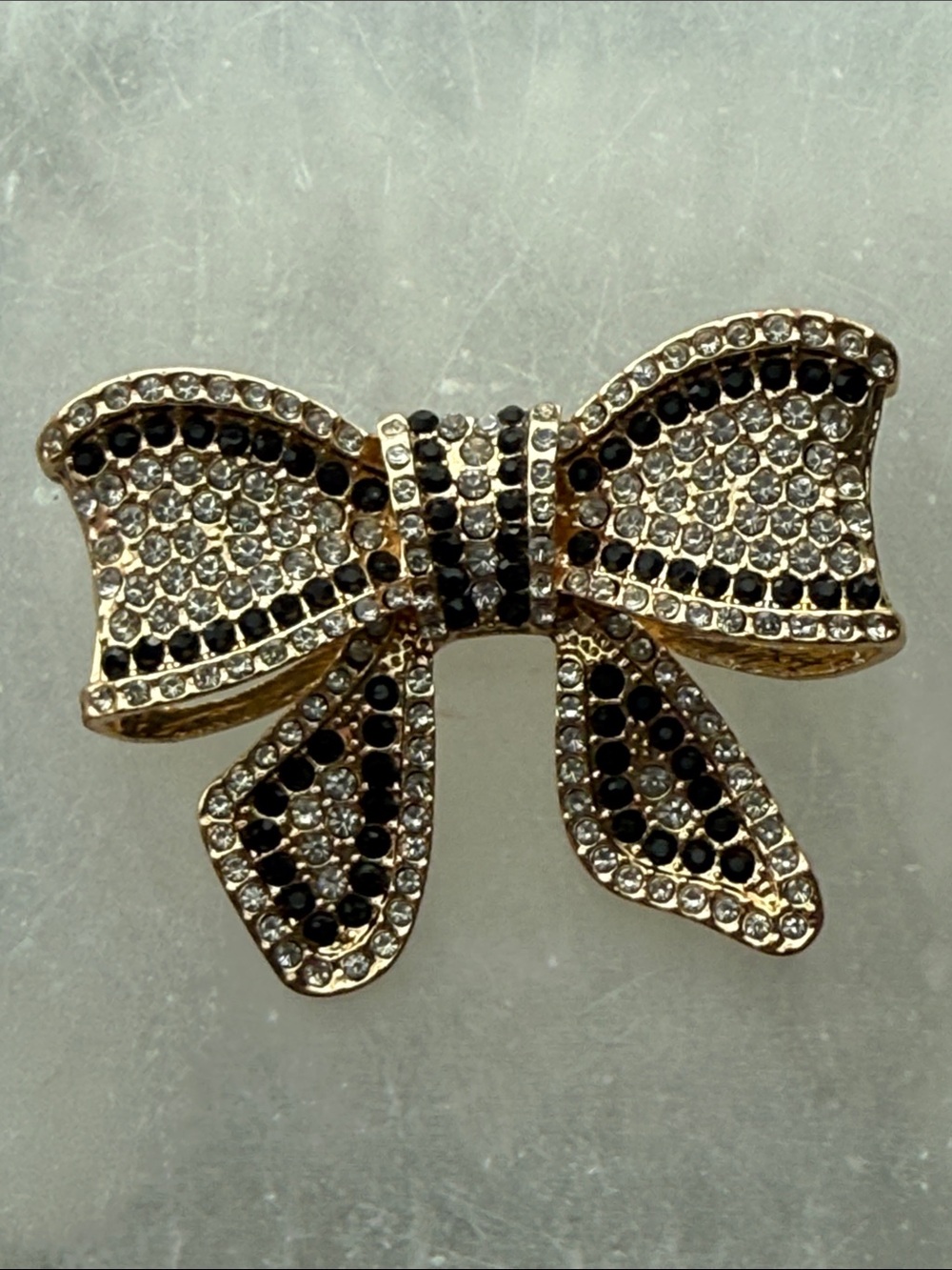 Gold Bow Crystal Brooch in Black and Clear rhinestones